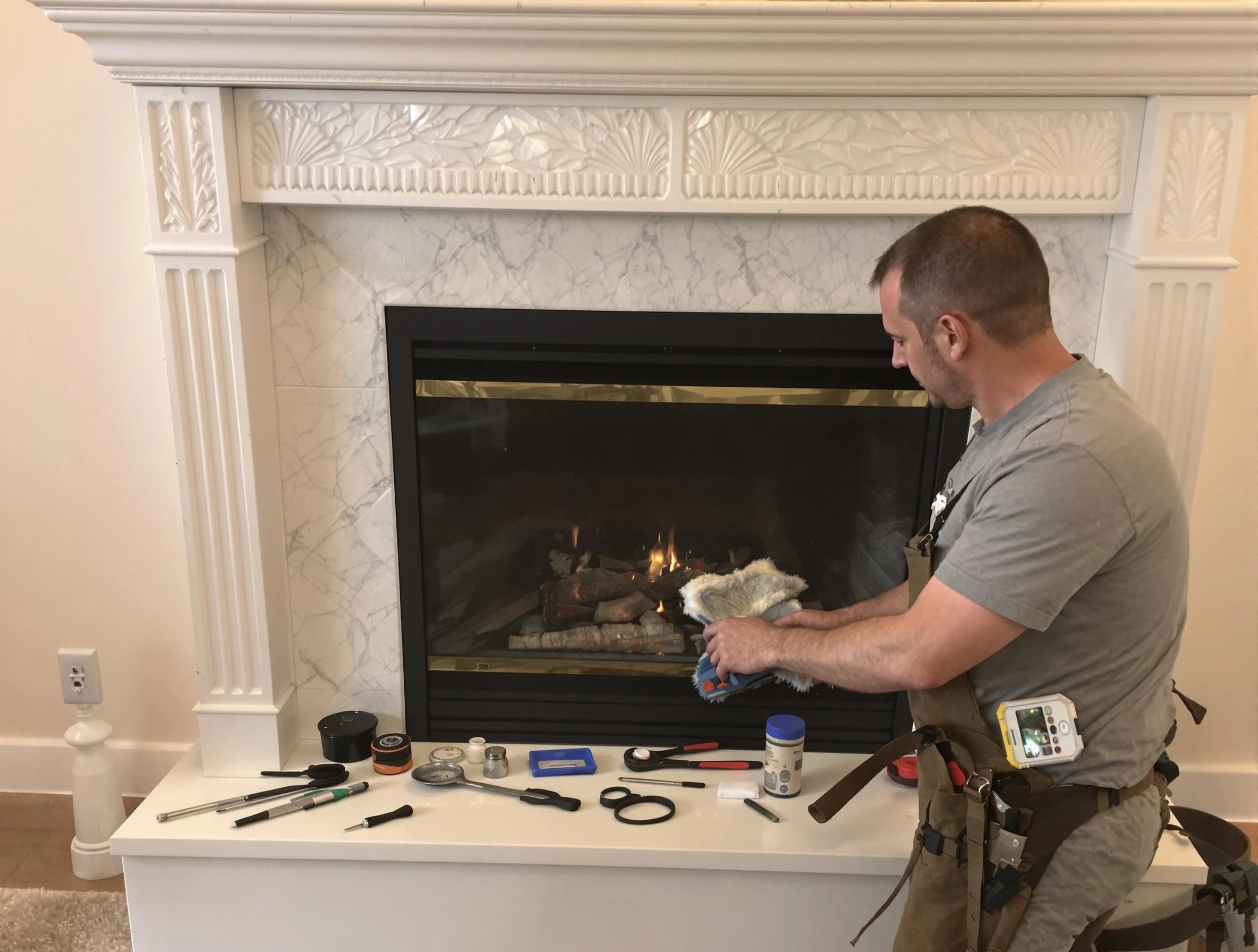 Woodstock Chimney Sweep performing fireplace maintenance in Woodstock, GA